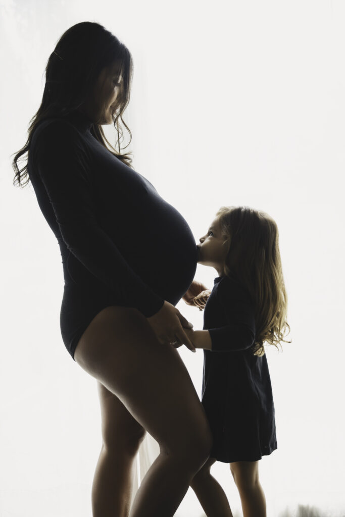 Dreamy Mommy and Me Maternity Photos in the Studio silhouette 