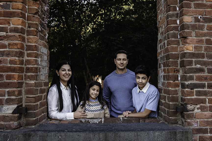 New York city family photos at Brooklyn Bridge framing