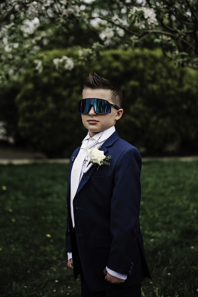Long Island Communion Photographer boy in suite
