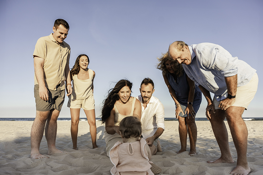 Breezy Sunset Family Photos on Long Beach Island making over baby