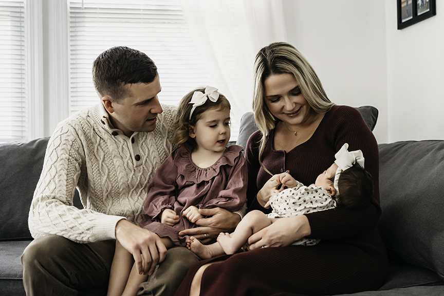 Cozy and Playful In Home New Baby Photos on the couch