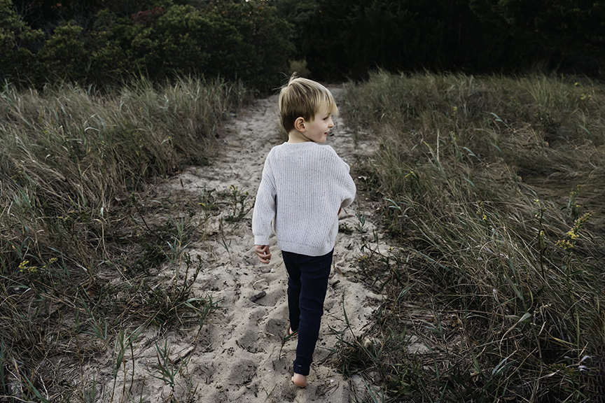 Big brother and baby sister family photos on Long Island toddler boy